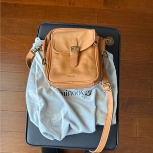 Tan Crossbody Bag with Buckle Detail by Minooy. The  best bag for travel!